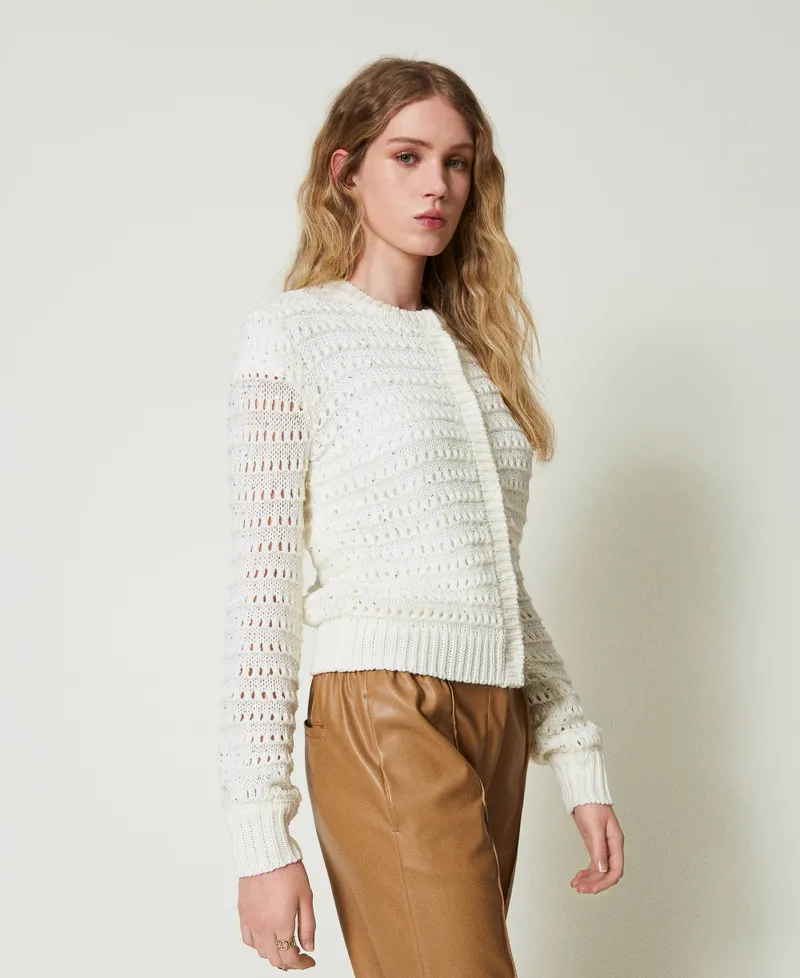 Cardigan traforato con paillettes