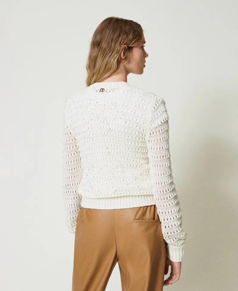 Cardigan traforato con paillettes
