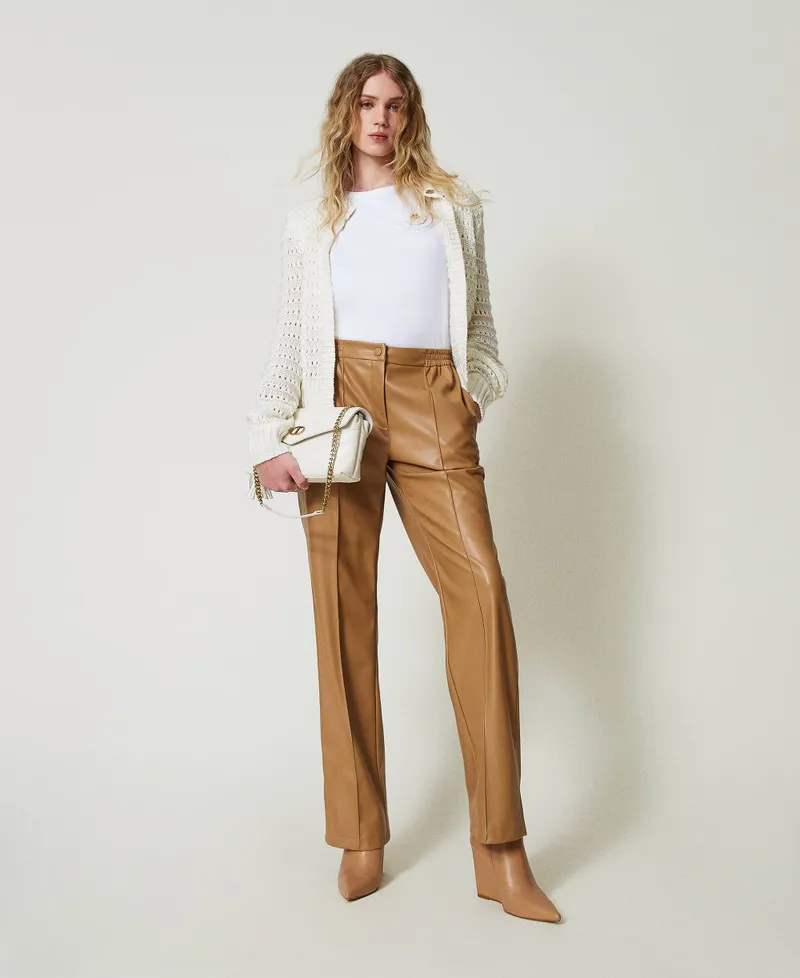 Cardigan traforato con paillettes