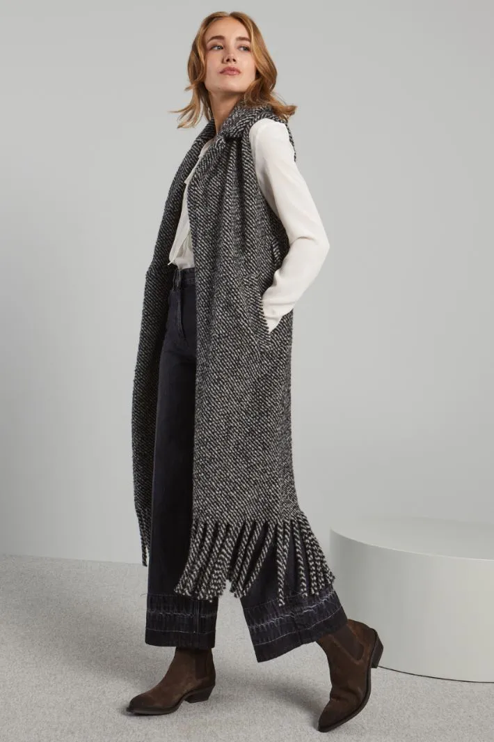Gilet in maglia con frange