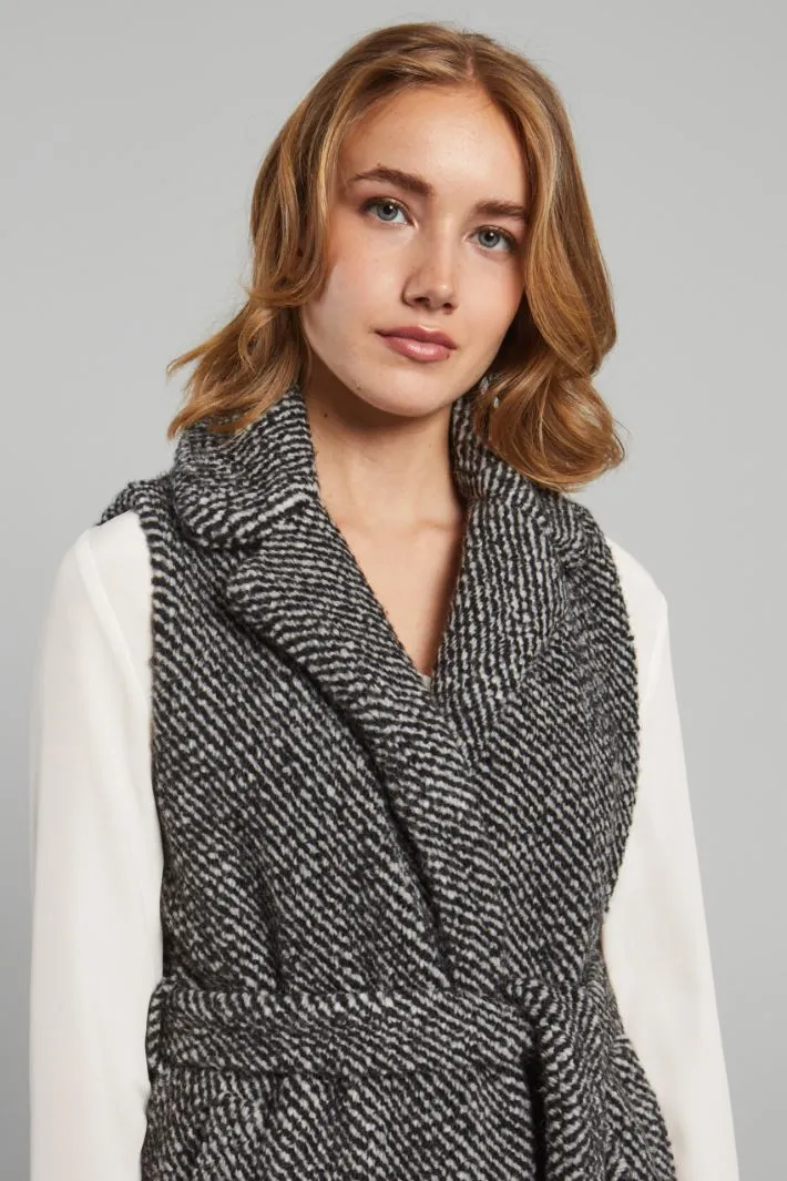 Gilet in maglia con frange