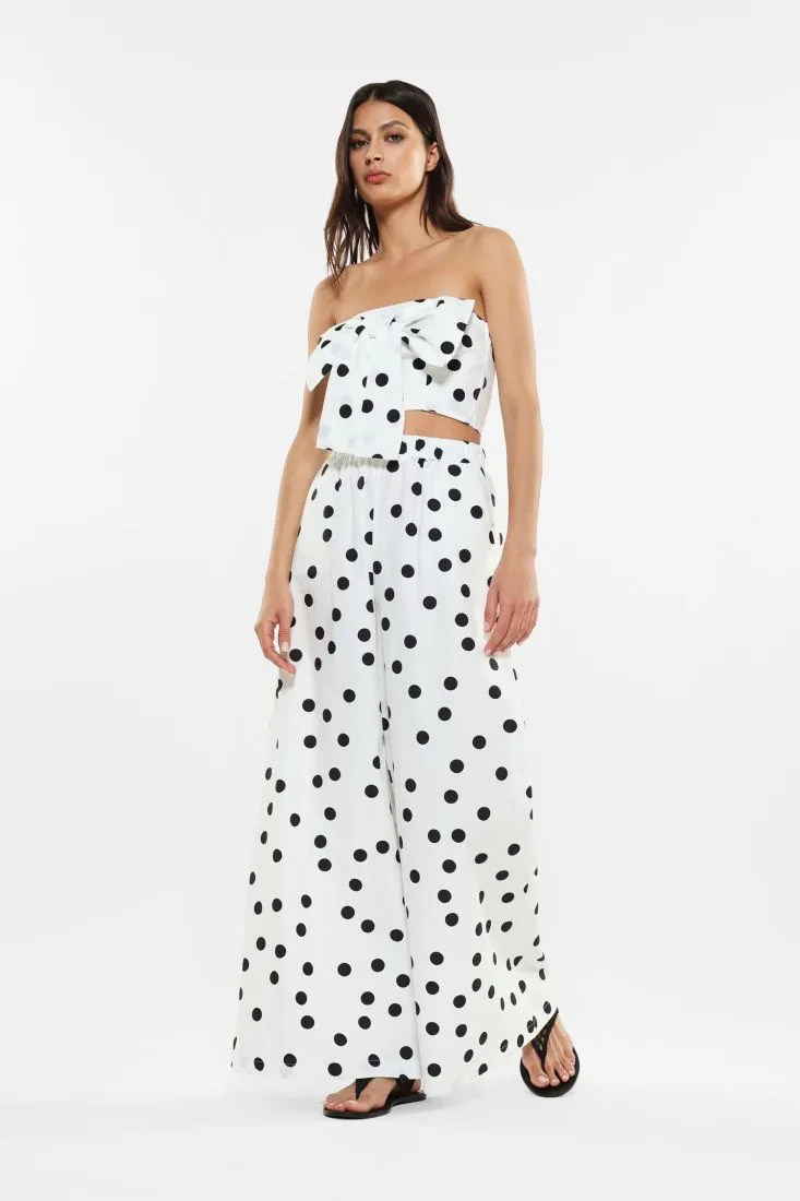 Pantaloni a palazzo fantasia a pois con pinces