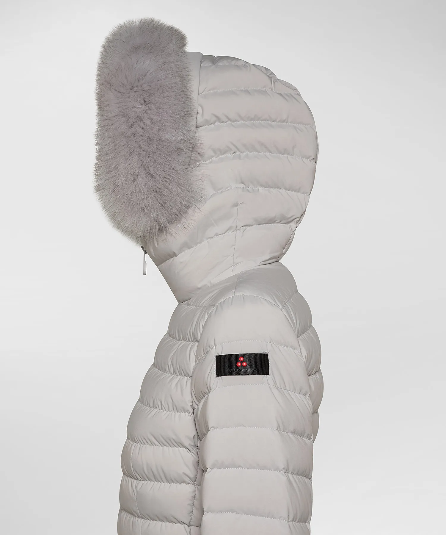 Piumino slim con pelliccia